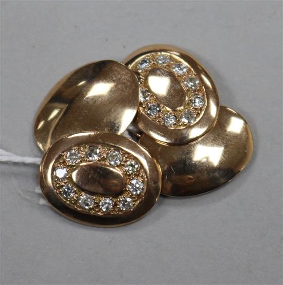 A pair of 9ct gold and diamond set oval cufflinks.